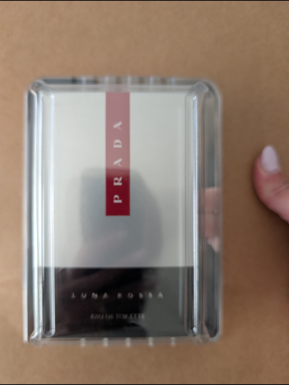Prada Eau de Parfum in White, Black and Red Packaging